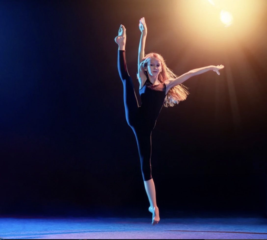 Dancer in a dramatic studio recital portrait by DLS Innovations
